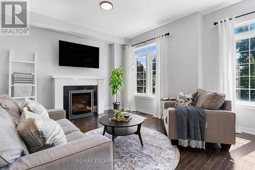 10 - 215 Dundas Street E, Hamilton (Waterdown), ON - Indoor Photo Showing Living Room With Fireplace