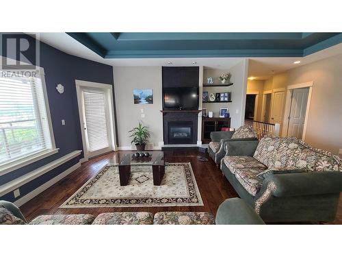 1047 Mt Ida Drive, Vernon, BC - Indoor Photo Showing Living Room With Fireplace