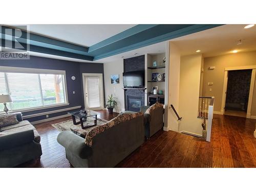 1047 Mt Ida Drive, Vernon, BC - Indoor Photo Showing Living Room With Fireplace