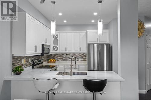 11 - 7 Atessa Drive, Hamilton (Ryckmans), ON - Indoor Photo Showing Kitchen With Stainless Steel Kitchen With Upgraded Kitchen