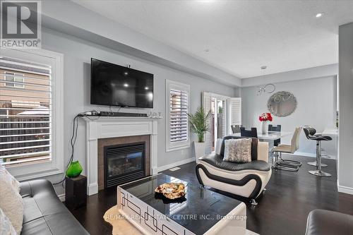 11 - 7 Atessa Drive, Hamilton, ON - Indoor Photo Showing Living Room With Fireplace