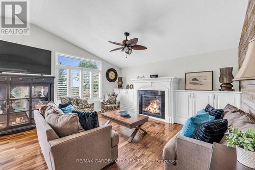 7 Pembroke Circle, Grimsby, ON - Indoor Photo Showing Living Room With Fireplace