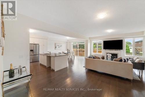 59 Fairey Crescent W, Hamilton (Mount Hope), ON - Indoor Photo Showing Living Room With Fireplace