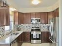 28 Scenic Ridge Gate, Brant (Paris), ON  - Indoor Photo Showing Kitchen With Stainless Steel Kitchen With Double Sink With Upgraded Kitchen 