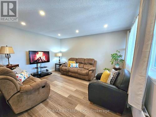 48 - 3050 Constitution Boulevard, Mississauga, ON - Indoor Photo Showing Living Room