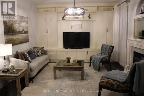 4617 Simmons Road W, Burlington (Alton), ON - Indoor Photo Showing Living Room With Fireplace