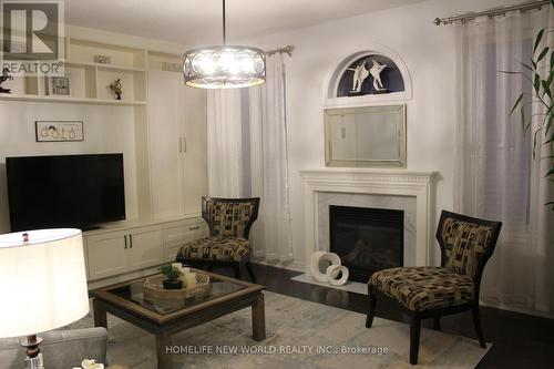 4617 Simmons Road W, Burlington (Alton), ON - Indoor Photo Showing Living Room With Fireplace