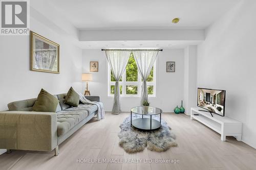 7 - 4025 Hickory Drive, Mississauga, ON - Indoor Photo Showing Living Room