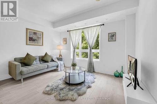 7 - 4025 Hickory Drive, Mississauga, ON - Indoor Photo Showing Living Room