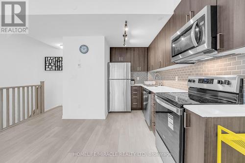 7 - 4025 Hickory Drive, Mississauga, ON - Indoor Photo Showing Kitchen With Stainless Steel Kitchen