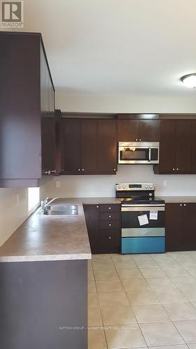 103 John Street, Halton Hills (Georgetown), ON - Indoor Photo Showing Kitchen With Double Sink