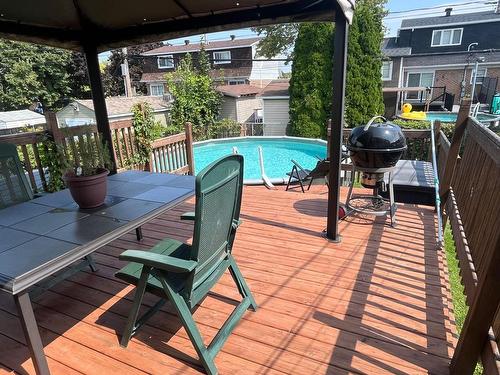 Terrasse - 235 Rue N.-Roussille, Terrebonne (Terrebonne), QC - Outdoor With Above Ground Pool With Exterior