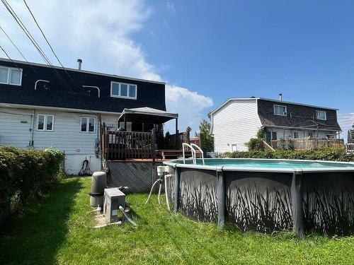 Backyard - 235 Rue N.-Roussille, Terrebonne (Terrebonne), QC - Outdoor With Above Ground Pool