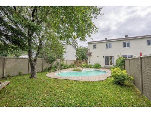 Cour - 6602 Rue Des Cygnes, Laval (Sainte-Rose), QC - Outdoor With In Ground Pool With Backyard