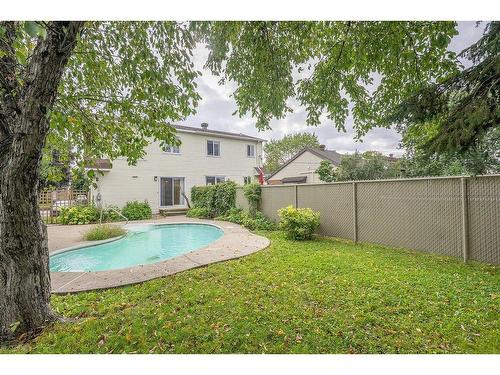 Cour - 6602 Rue Des Cygnes, Laval (Sainte-Rose), QC - Outdoor With In Ground Pool With Backyard