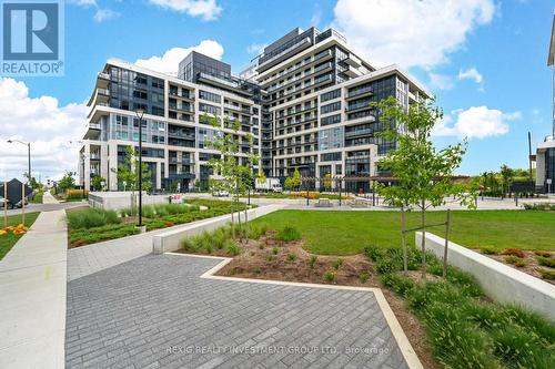 615 - 3200 William Coltson Avenue, Oakville, ON - Outdoor With Balcony With Facade