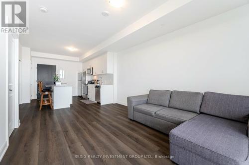 615 - 3200 William Coltson Avenue, Oakville, ON - Indoor Photo Showing Living Room