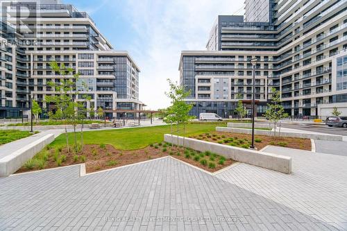 615 - 3200 William Coltson Avenue, Oakville, ON - Outdoor With Balcony With Facade