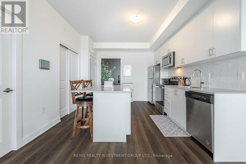 615 - 3200 William Coltson Avenue, Oakville, ON - Indoor Photo Showing Kitchen