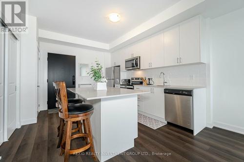 615 - 3200 William Coltson Avenue, Oakville, ON - Indoor Photo Showing Kitchen With Stainless Steel Kitchen