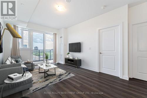 615 - 3200 William Coltson Avenue, Oakville, ON - Indoor Photo Showing Living Room