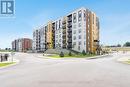 211 - 8 Culinary Lane, Barrie (Innis-Shore), ON  - Outdoor With Balcony With Facade 