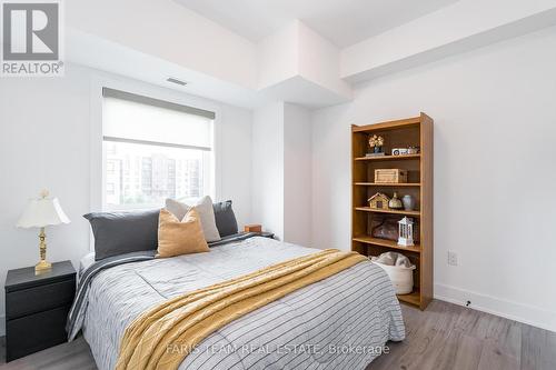 211 - 8 Culinary Lane, Barrie (Innis-Shore), ON - Indoor Photo Showing Bedroom