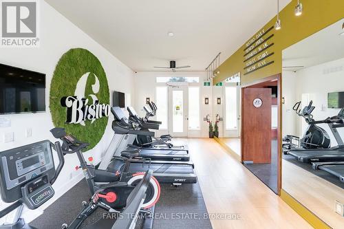 211 - 8 Culinary Lane, Barrie (Innis-Shore), ON - Indoor Photo Showing Gym Room