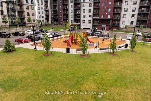 610 - 5 Chef Lane, Barrie (Innis-Shore), ON - Outdoor With Balcony With Facade