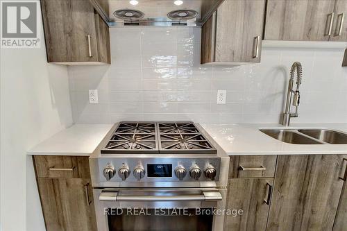 610 - 5 Chef Lane, Barrie (Innis-Shore), ON - Indoor Photo Showing Kitchen With Double Sink With Upgraded Kitchen