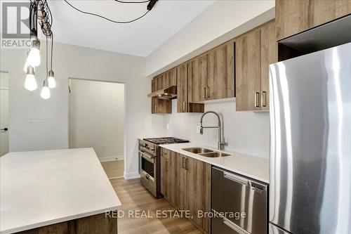 610 - 5 Chef Lane, Barrie (Innis-Shore), ON - Indoor Photo Showing Kitchen With Double Sink With Upgraded Kitchen