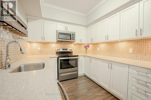 411 - 306 Essa Road, Barrie (400 West), ON - Indoor Photo Showing Kitchen With Upgraded Kitchen