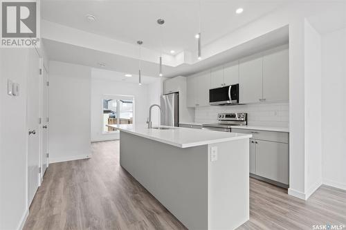 203 Cowessess Road, Saskatoon, SK - Indoor Photo Showing Kitchen With Upgraded Kitchen