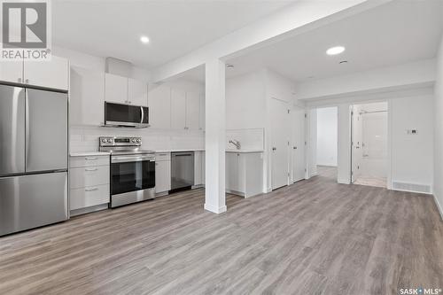 203 Cowessess Road, Saskatoon, SK - Indoor Photo Showing Kitchen With Stainless Steel Kitchen