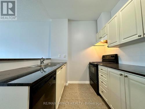 104 - 1 Sidney Lane, Clarington (Bowmanville), ON - Indoor Photo Showing Kitchen With Double Sink