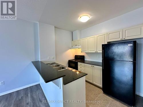 104 - 1 Sidney Lane, Clarington (Bowmanville), ON - Indoor Photo Showing Kitchen With Double Sink