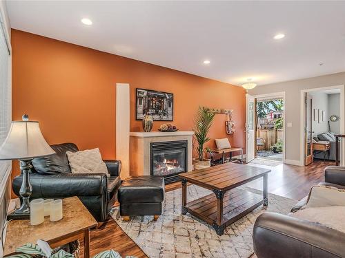 102-3776 Departure Bay Rd, Nanaimo, BC - Indoor Photo Showing Living Room With Fireplace