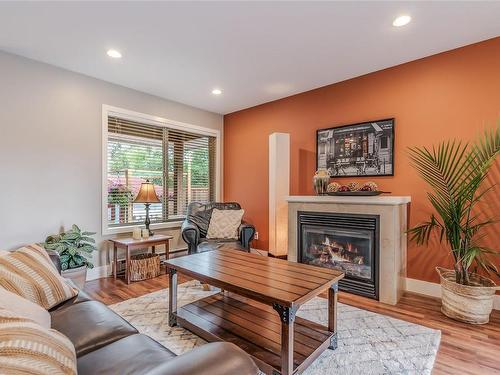 102-3776 Departure Bay Rd, Nanaimo, BC - Indoor Photo Showing Living Room With Fireplace