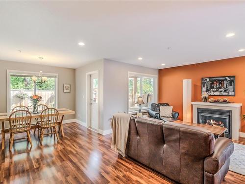 102-3776 Departure Bay Rd, Nanaimo, BC - Indoor Photo Showing Living Room With Fireplace