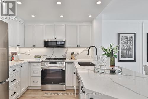 1106 - 7440 Bathurst Street, Vaughan, ON - Indoor Photo Showing Kitchen With Stainless Steel Kitchen With Double Sink With Upgraded Kitchen