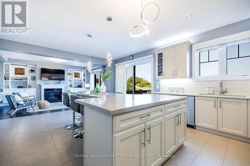 2357 New Providence Street, Oshawa (Windfields), ON - Indoor Photo Showing Kitchen With Fireplace