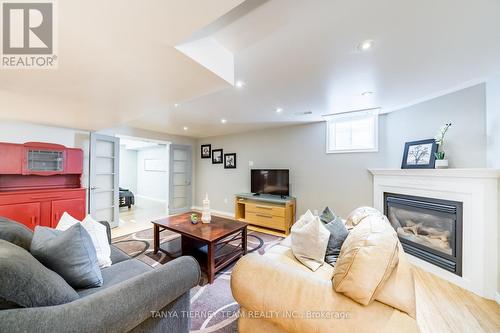 8 Nathan Avenue, Whitby (Brooklin), ON - Indoor Photo Showing Living Room With Fireplace