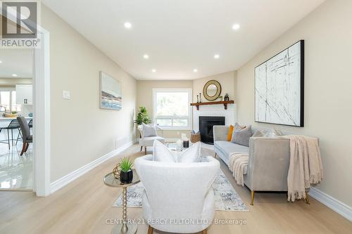 60 Cluett Drive, Ajax (South East), ON - Indoor Photo Showing Living Room With Fireplace