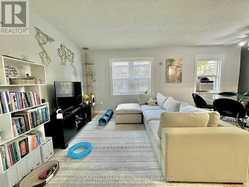 303 - 114 Vaughan Road, Toronto (Humewood-Cedarvale), ON - Indoor Photo Showing Living Room