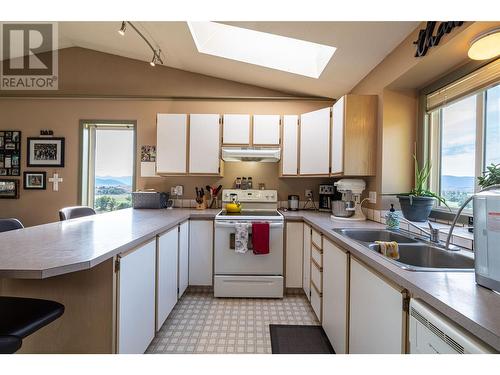 4242 De Roo Road, Vernon, BC - Indoor Photo Showing Kitchen With Double Sink