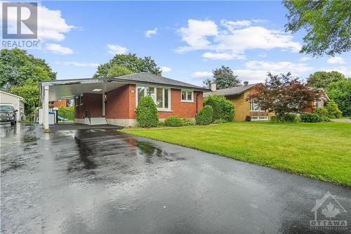 Charming mid-century bungalow with modern updates, nestled in a serene neighborhood. - 1155 Minnetonka Road, Ottawa, ON - Outdoor