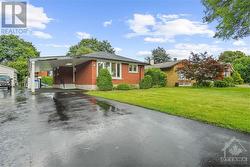 Charming mid-century bungalow with modern updates, nestled in a serene neighborhood. - 