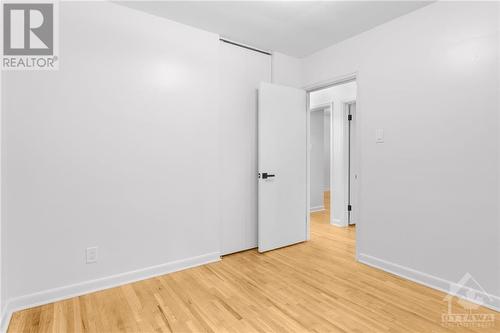 Cozy second bedroom with ample natural light, perfect for guests or a home office. - 1155 Minnetonka Road, Ottawa, ON - Indoor Photo Showing Other Room