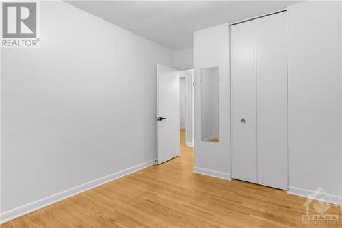 Cozy second bedroom with ample natural light, perfect for guests or a home office. - 1155 Minnetonka Road, Ottawa, ON - Indoor Photo Showing Other Room