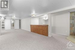 Spacious basement recreation room with potential for additional rental income. - 